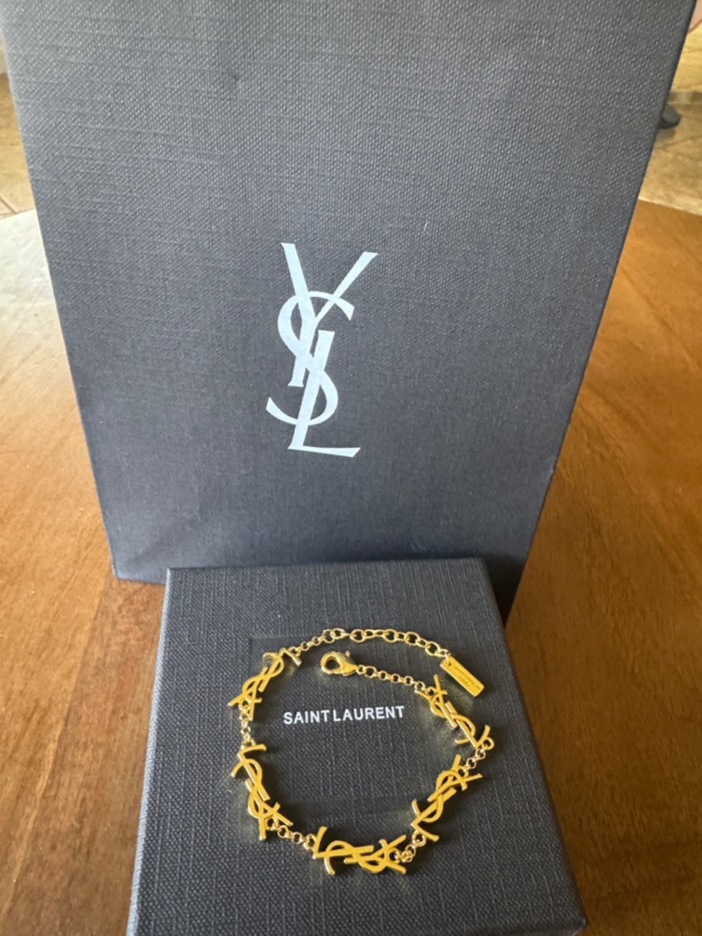 Saint Laurent Gold-Tone YSL Link Bracelet - Picture 9 of 9